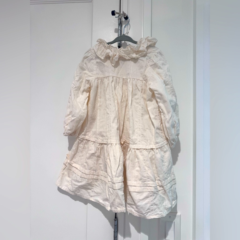 Louisiella dress. Cream. Bottoms down back. Ruffle collar. Size 3T.